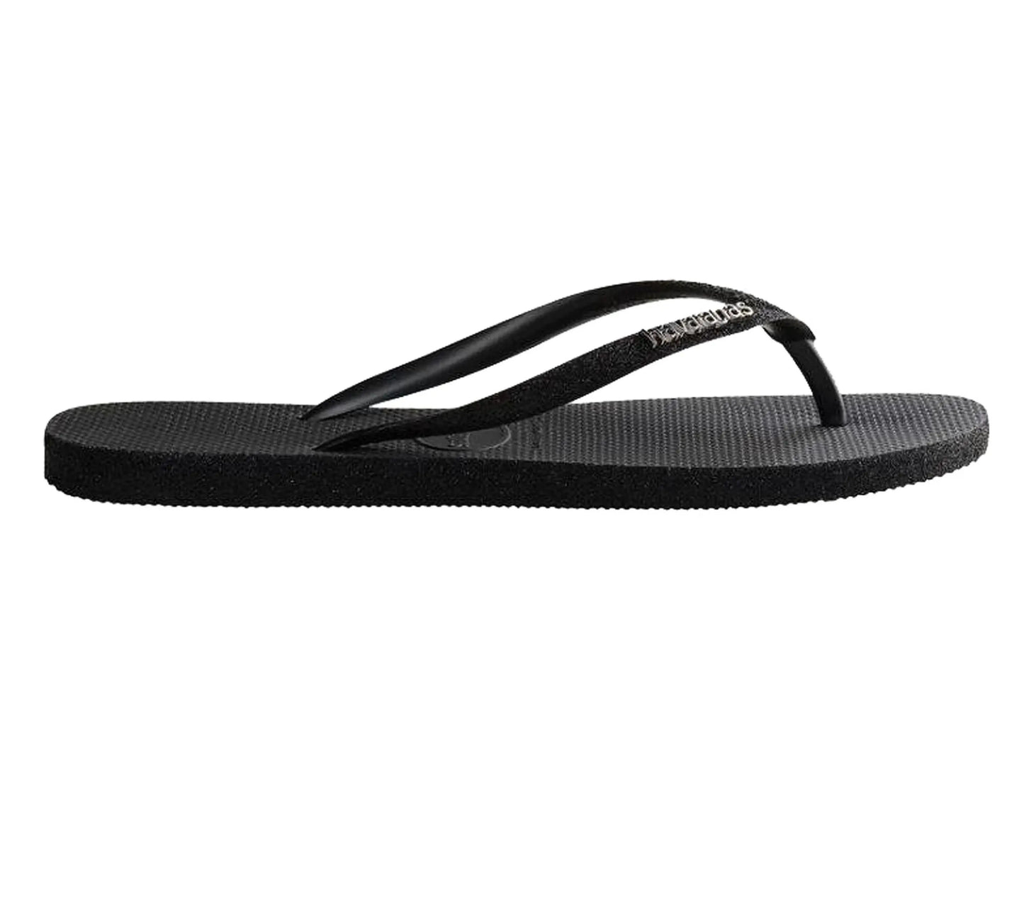 Γυναικείες σαγιονάρες Havaianas Slim Sparkle Me FC, λήψη από το πλάι που αναδεικνύει την φόρμα της