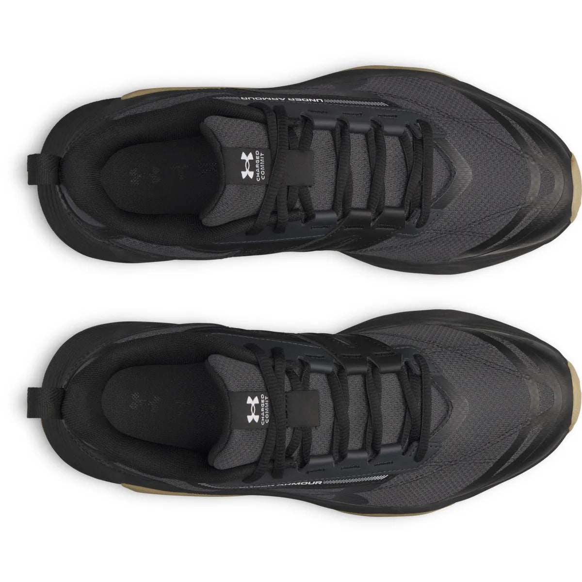 Under Armour Charged Commit TR 5 σε πάνω λήψη που αναδεικνύει τα κορδόνια και την εφαρμογή